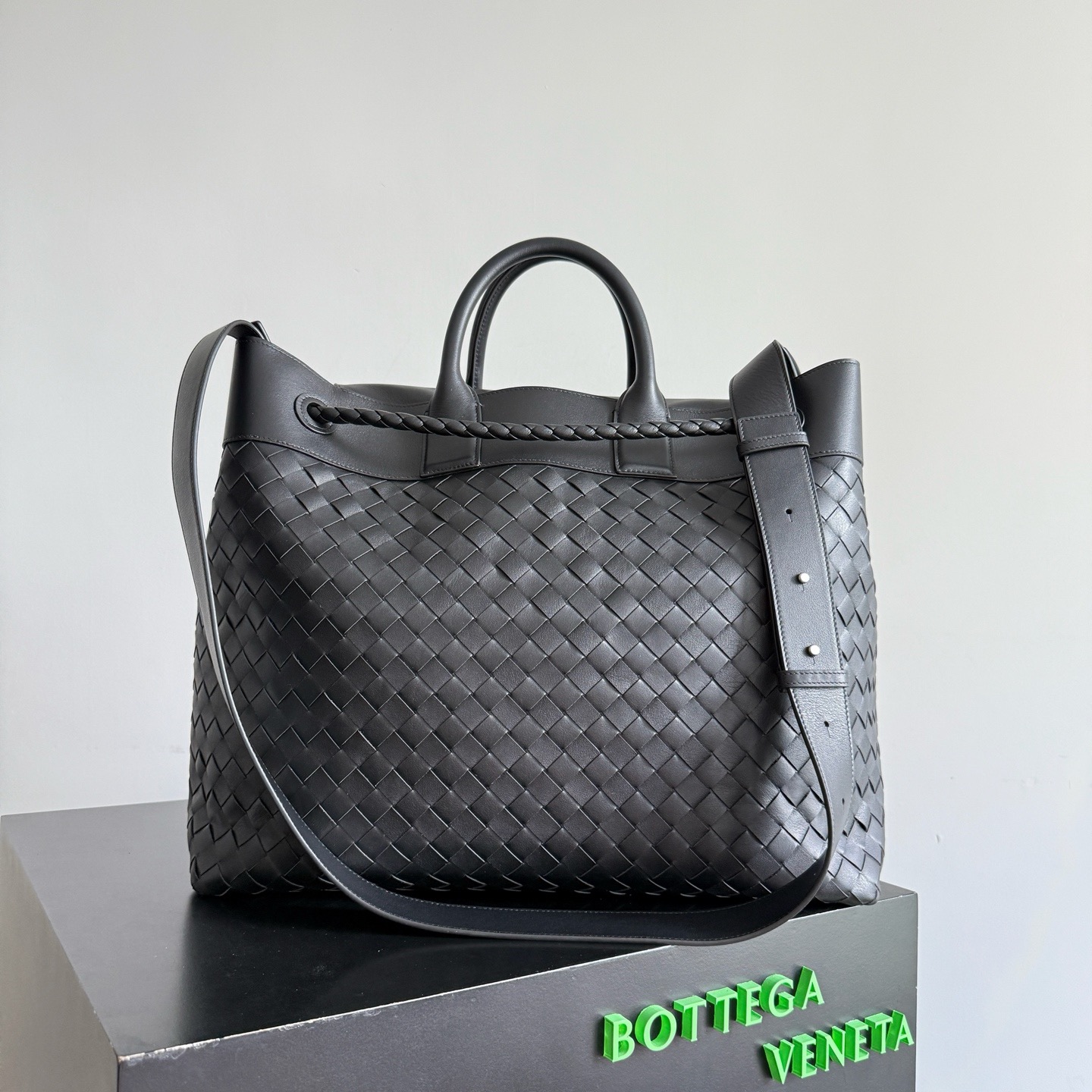BV Andiamo Voyager travel bag black Intrecciato woven leather