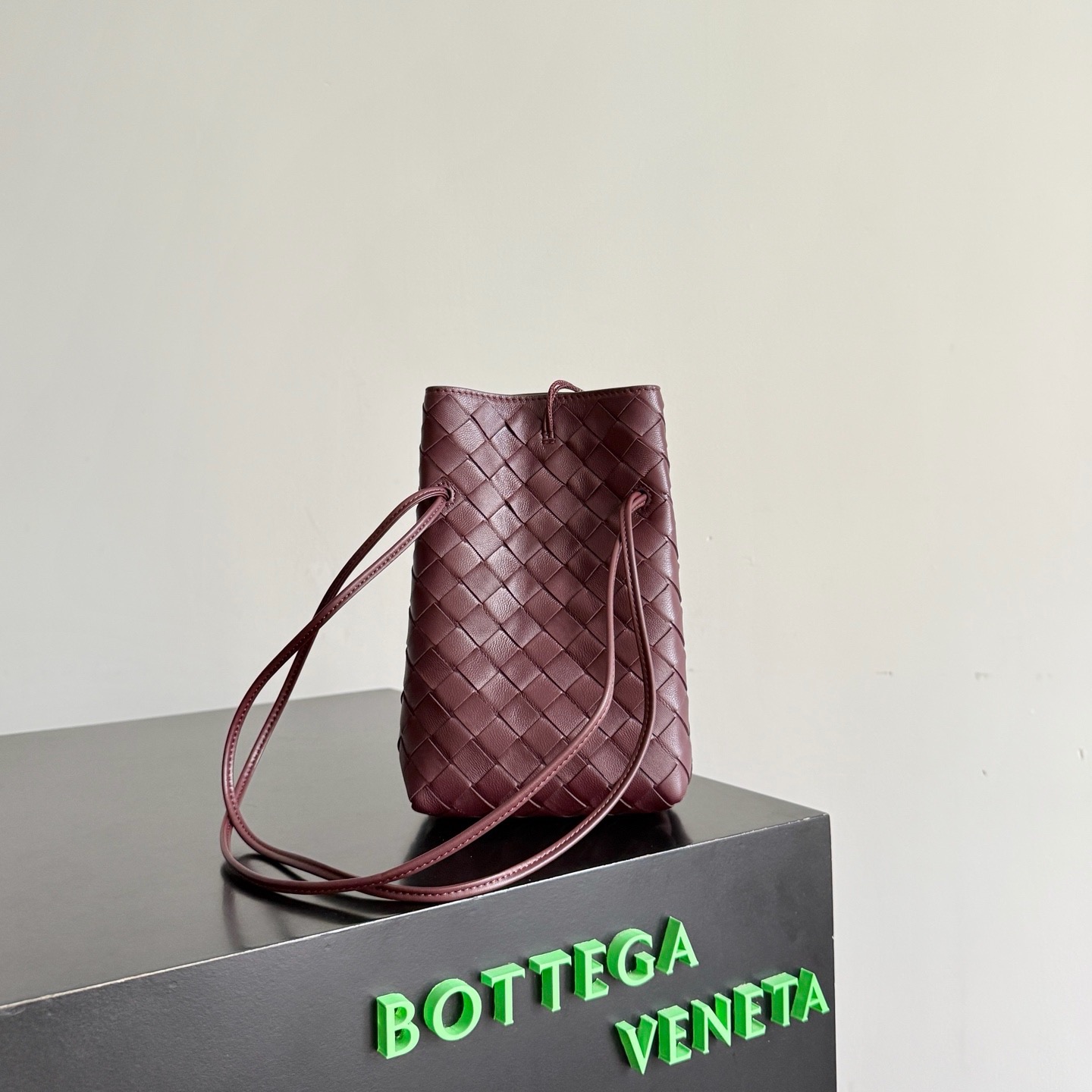 BV Andiamo phone crossbody bag burgundy Intrecciato woven sheepskin