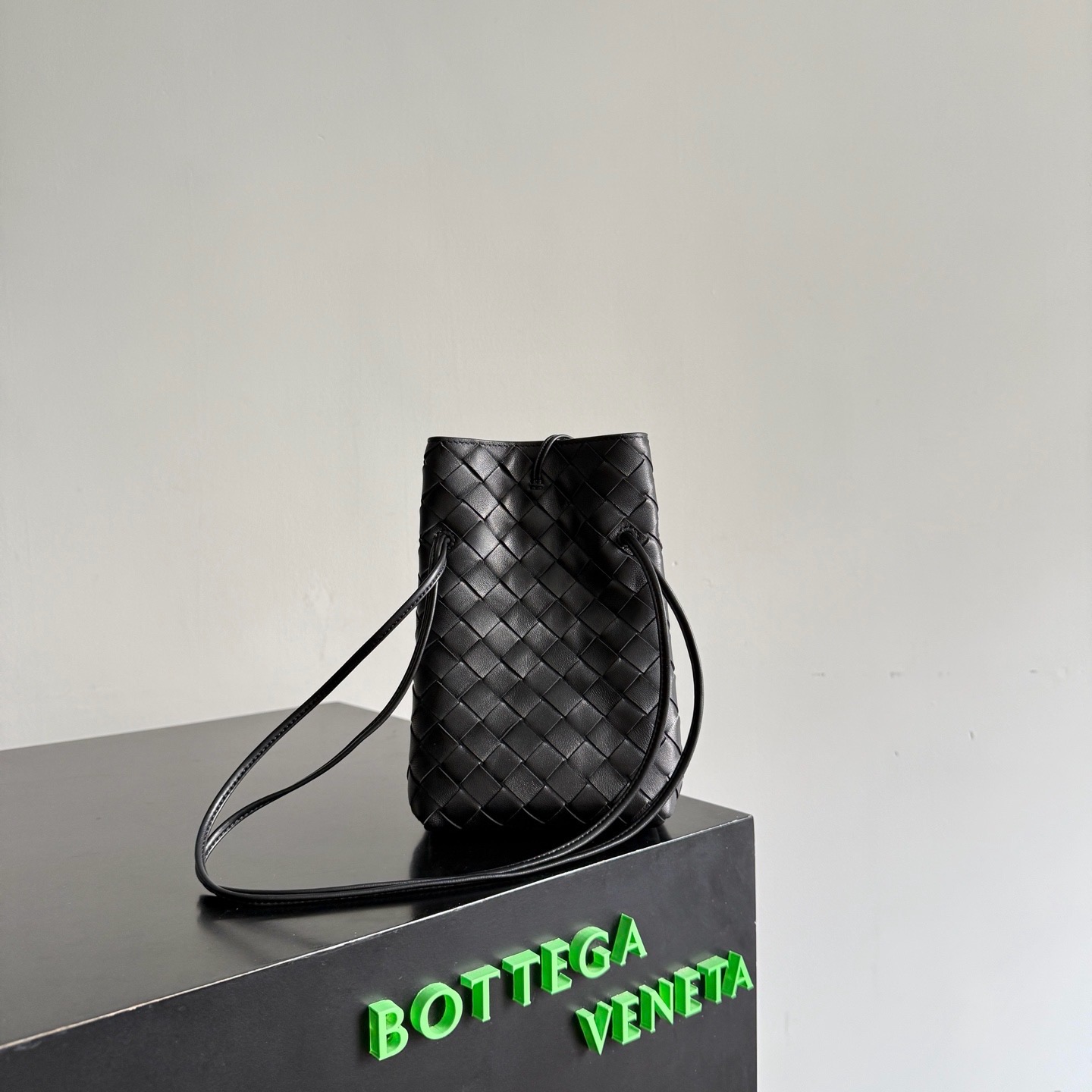 BV Andiamo phone crossbody bag black Intrecciato woven sheepskin