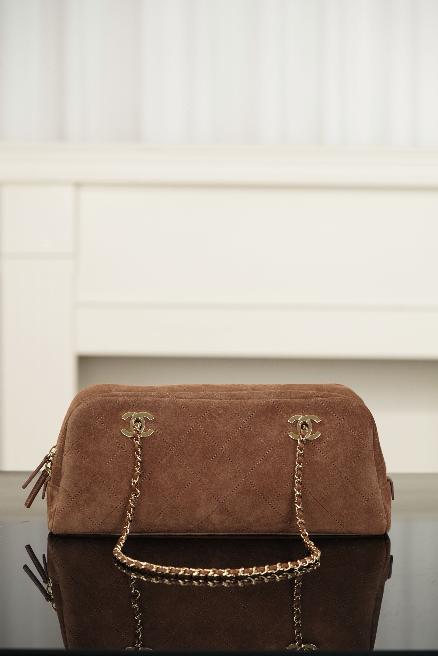 Brown suede Chanel 26A chain baguette bag