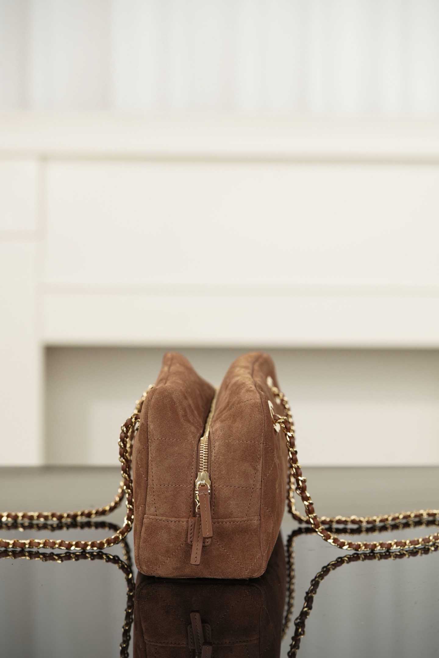 Brown suede Chanel 26A chain baguette bag