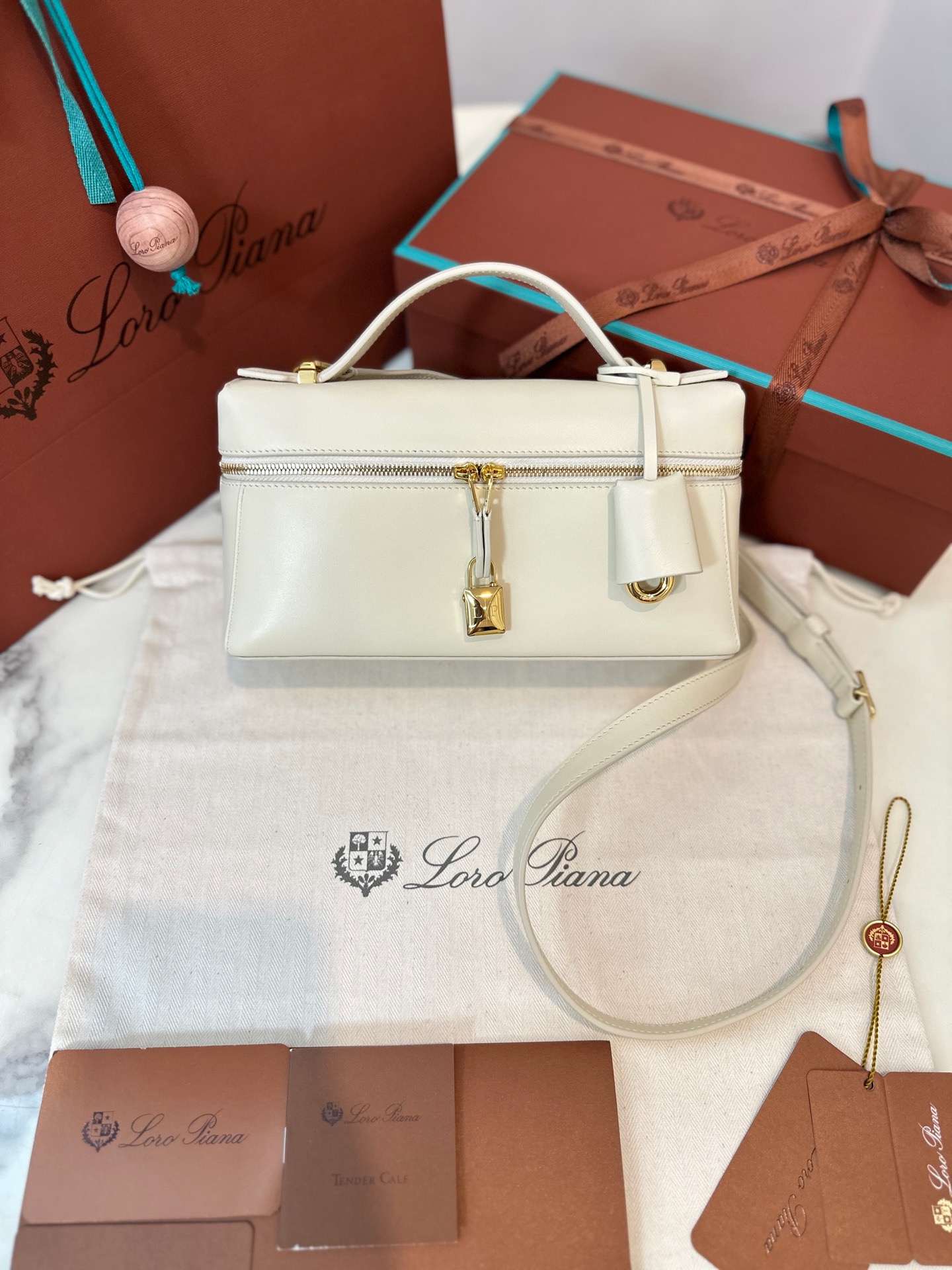 Loro Piana extra bag l23 off-white leather shoulder bag with gold hardware