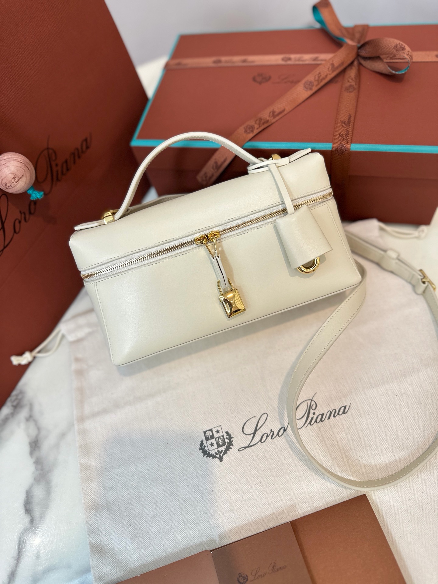 Loro Piana extra bag l23 off-white leather shoulder bag with gold hardware