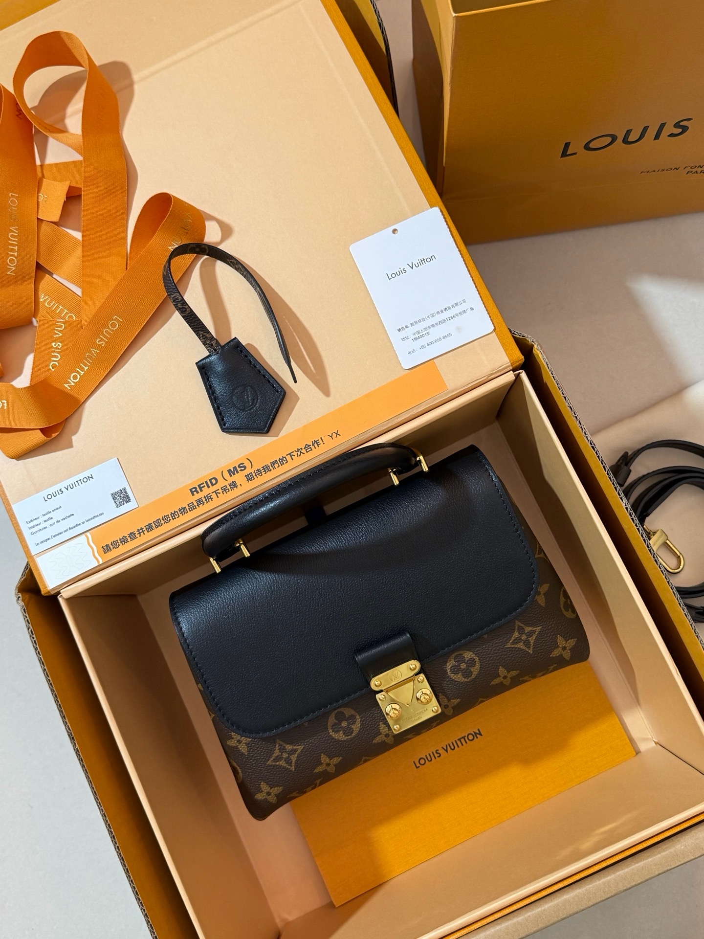 LV M27511 monogram black Madeleine BB handbag