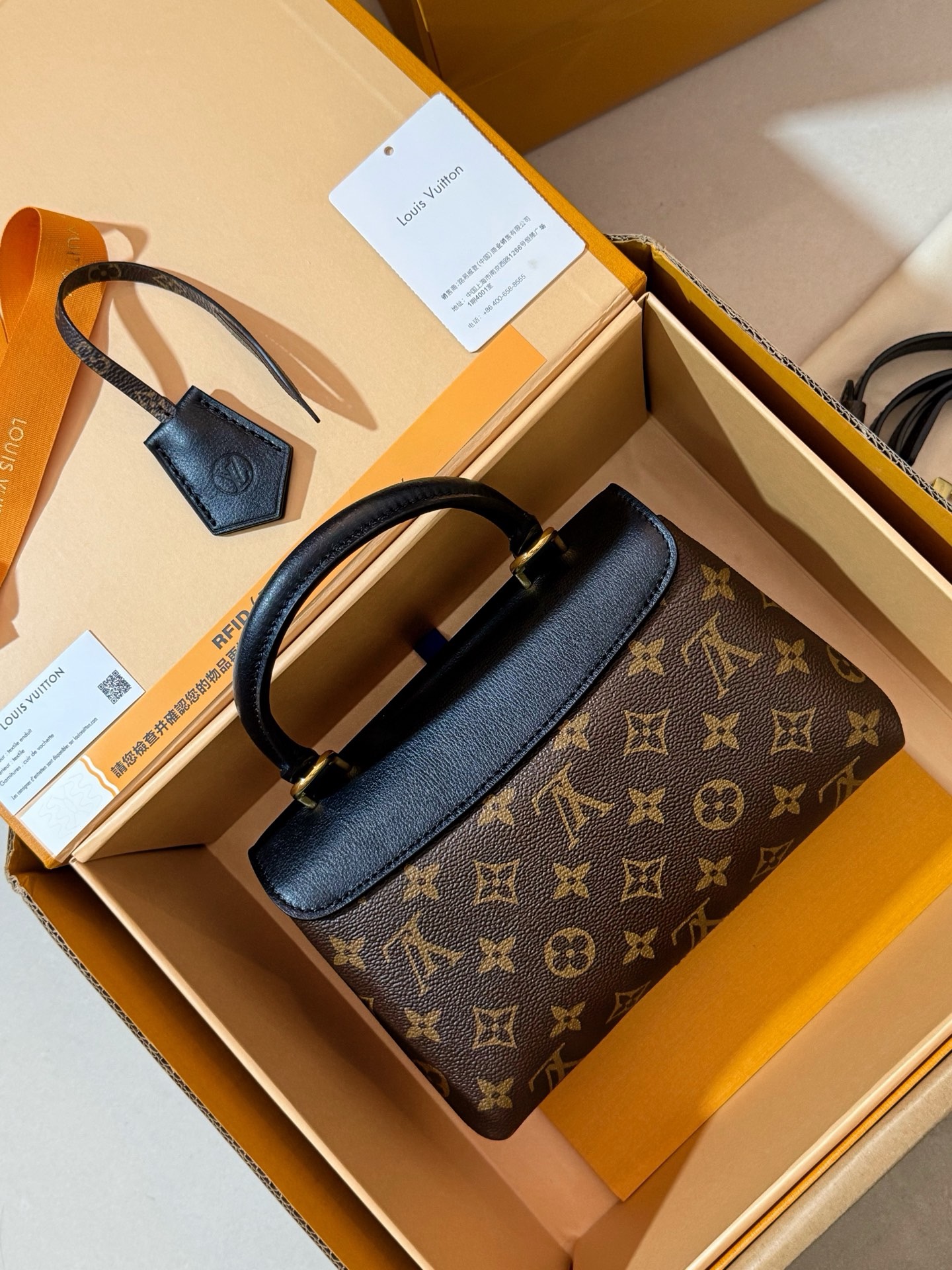 LV M27511 monogram black Madeleine BB handbag
