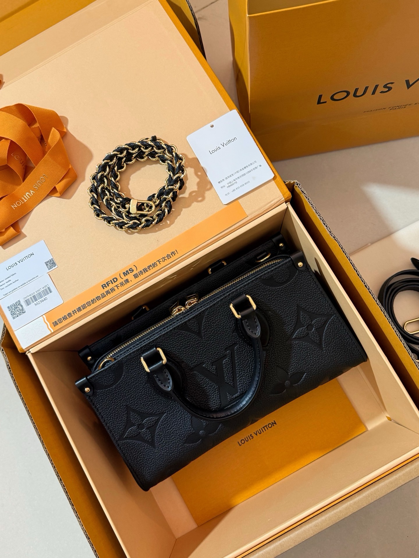 LV M23640 black embossed OnTheGo East West horizontal tote bag