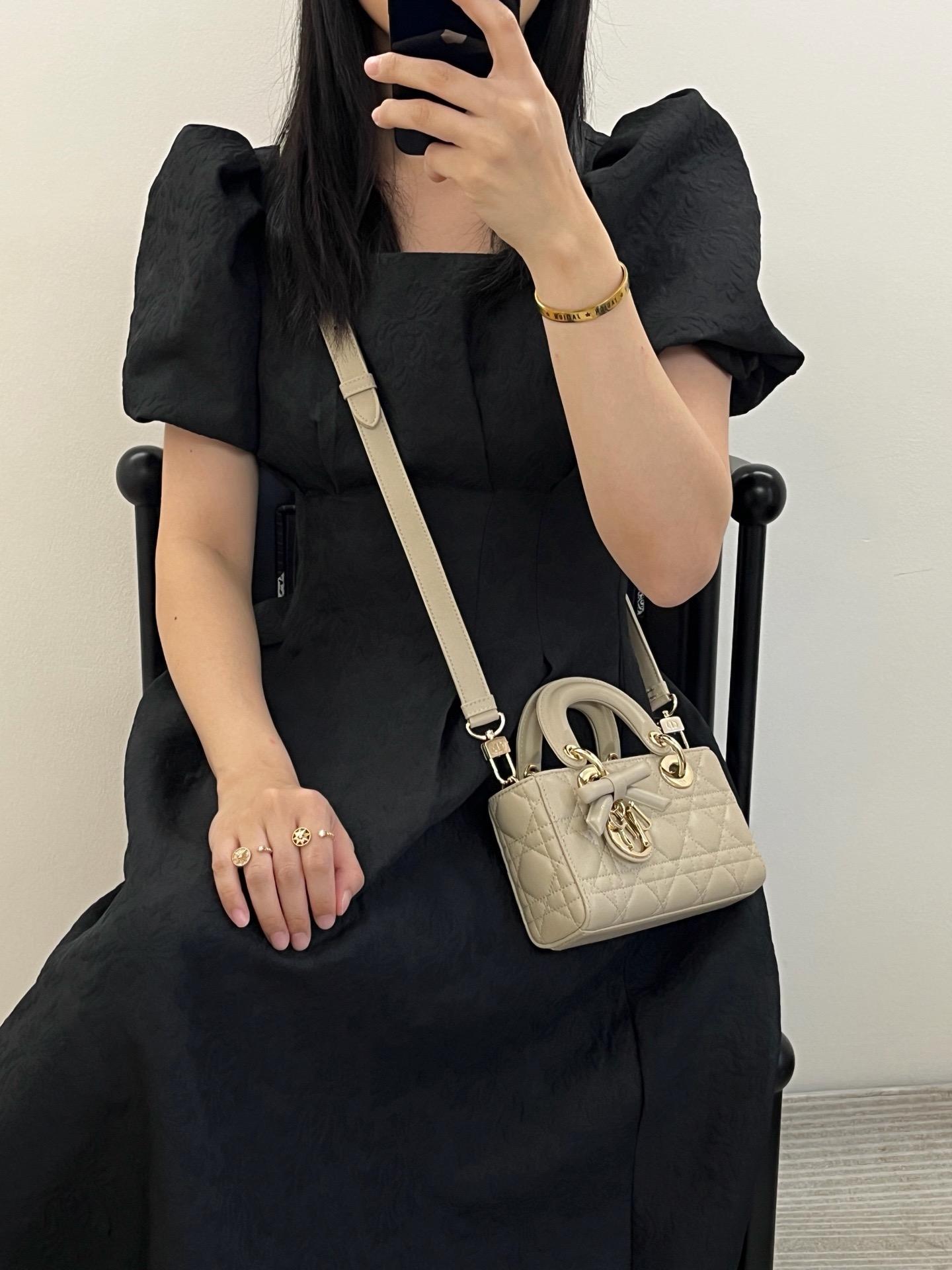 Wearing real shots of Dior mini Lady D-Joy cream apricot lambskin handbag