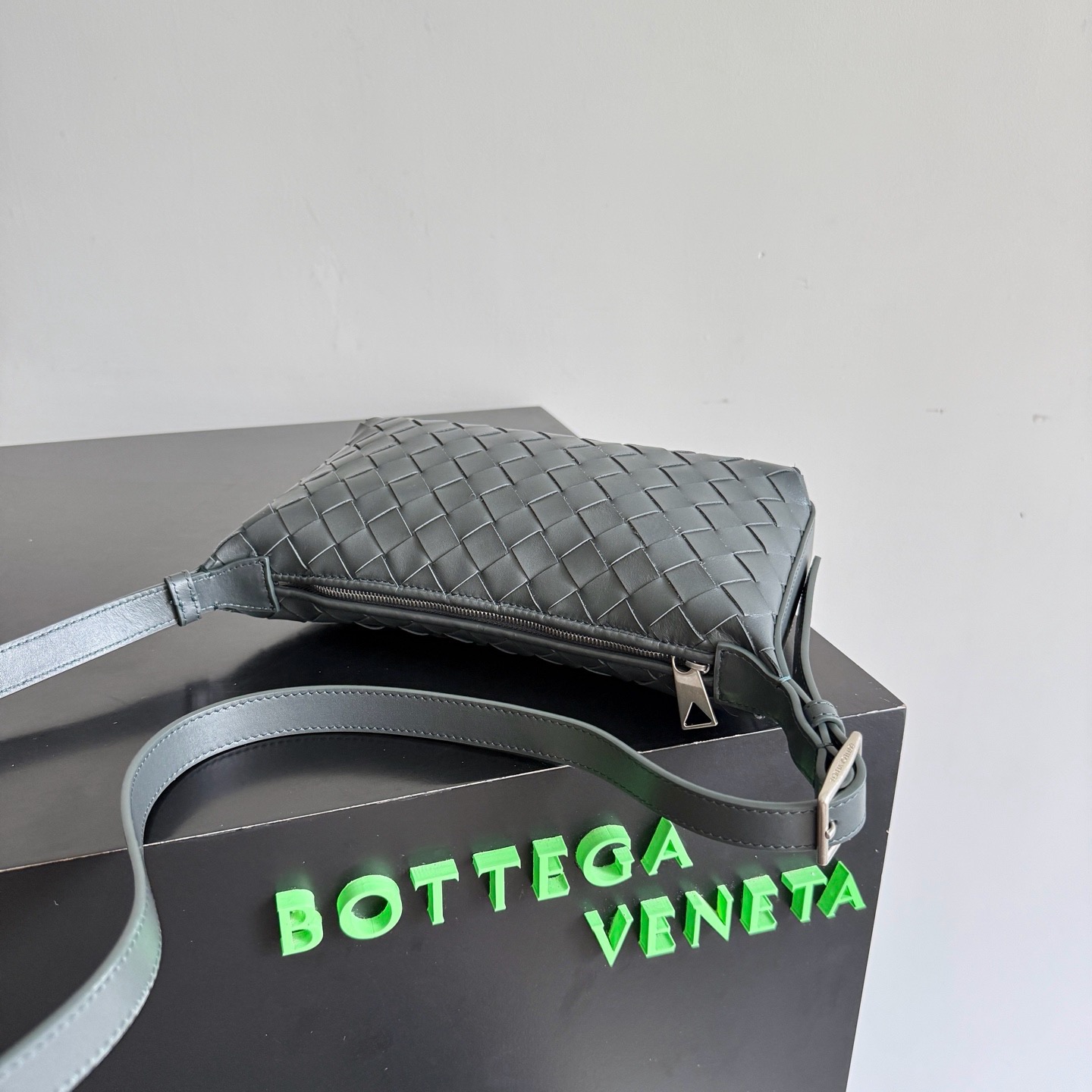 Bottega Veneta Traveler black calfskin woven phone bag

