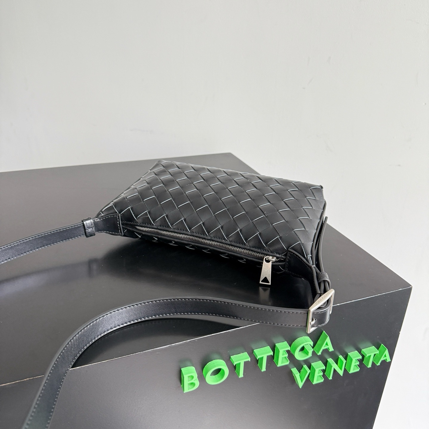 Bottega Veneta Traveler black calfskin woven phone bag