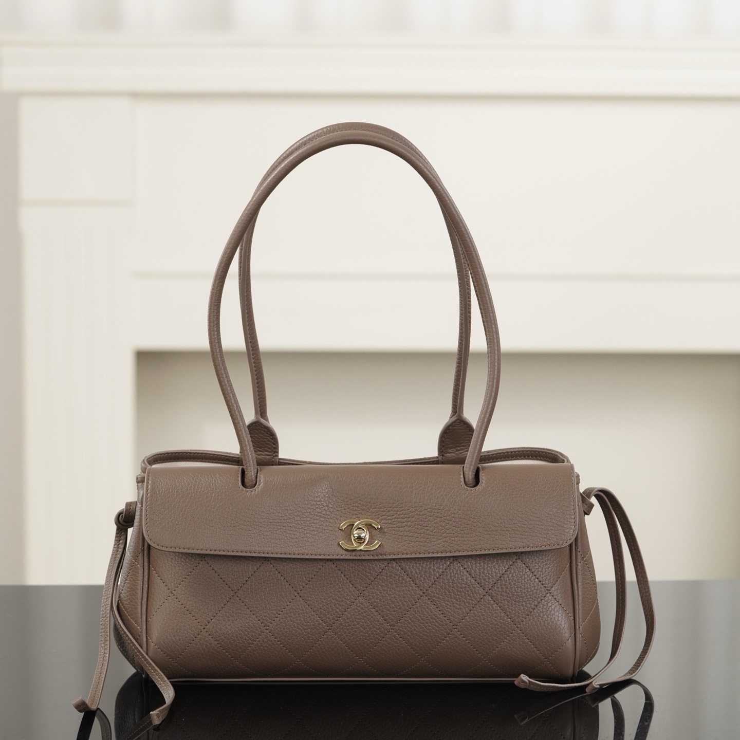 Chanel light brown grained leather baguette bag