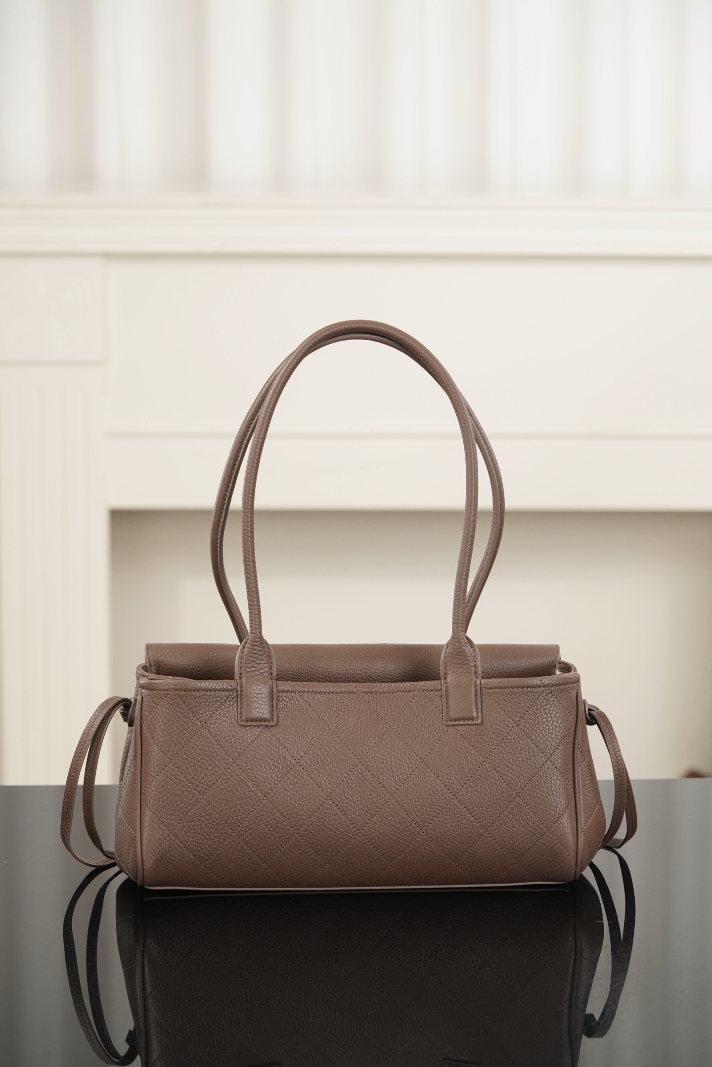 Chanel light brown grained leather baguette bag