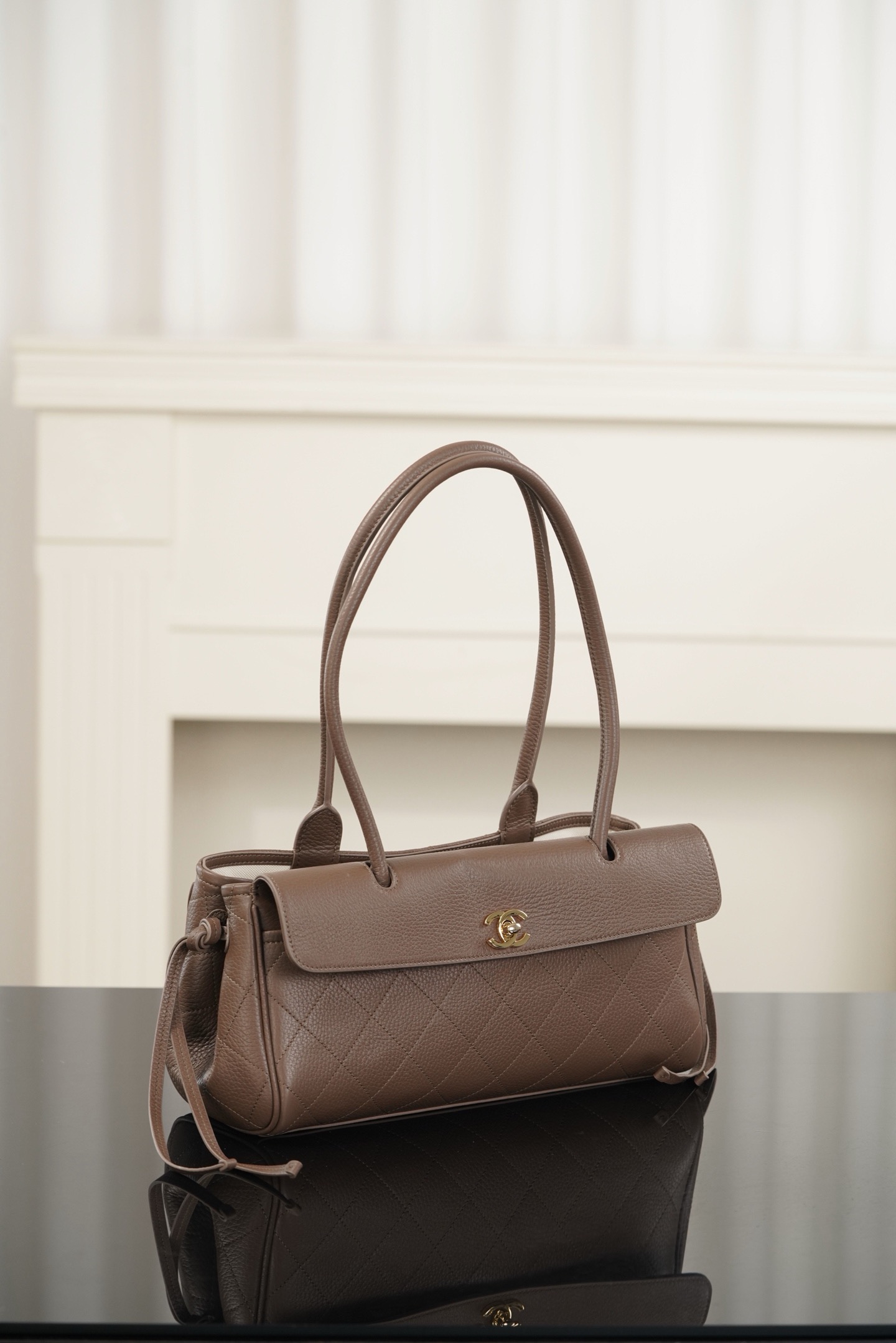 Chanel light brown grained leather baguette bag