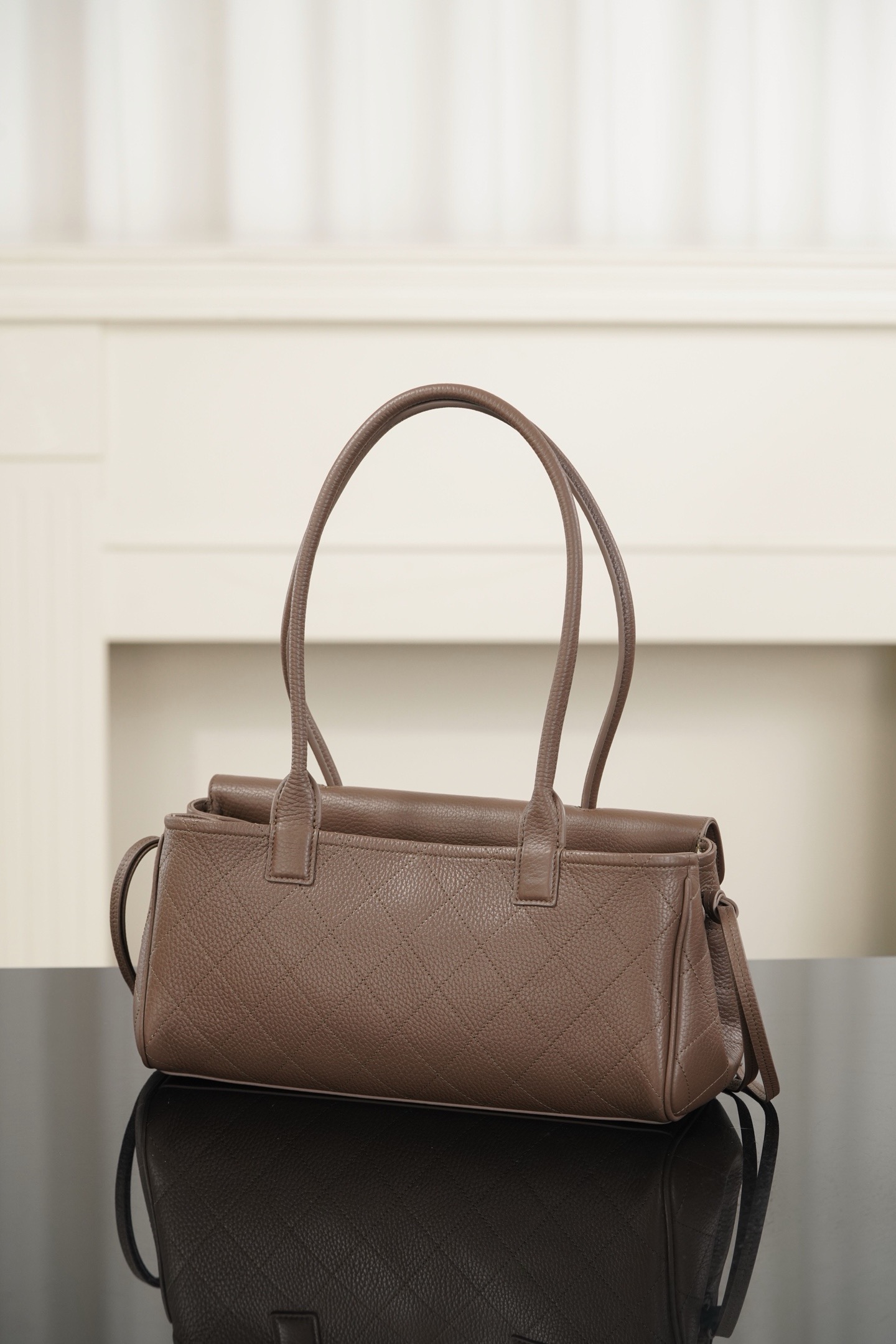 Chanel light brown grained leather baguette bag