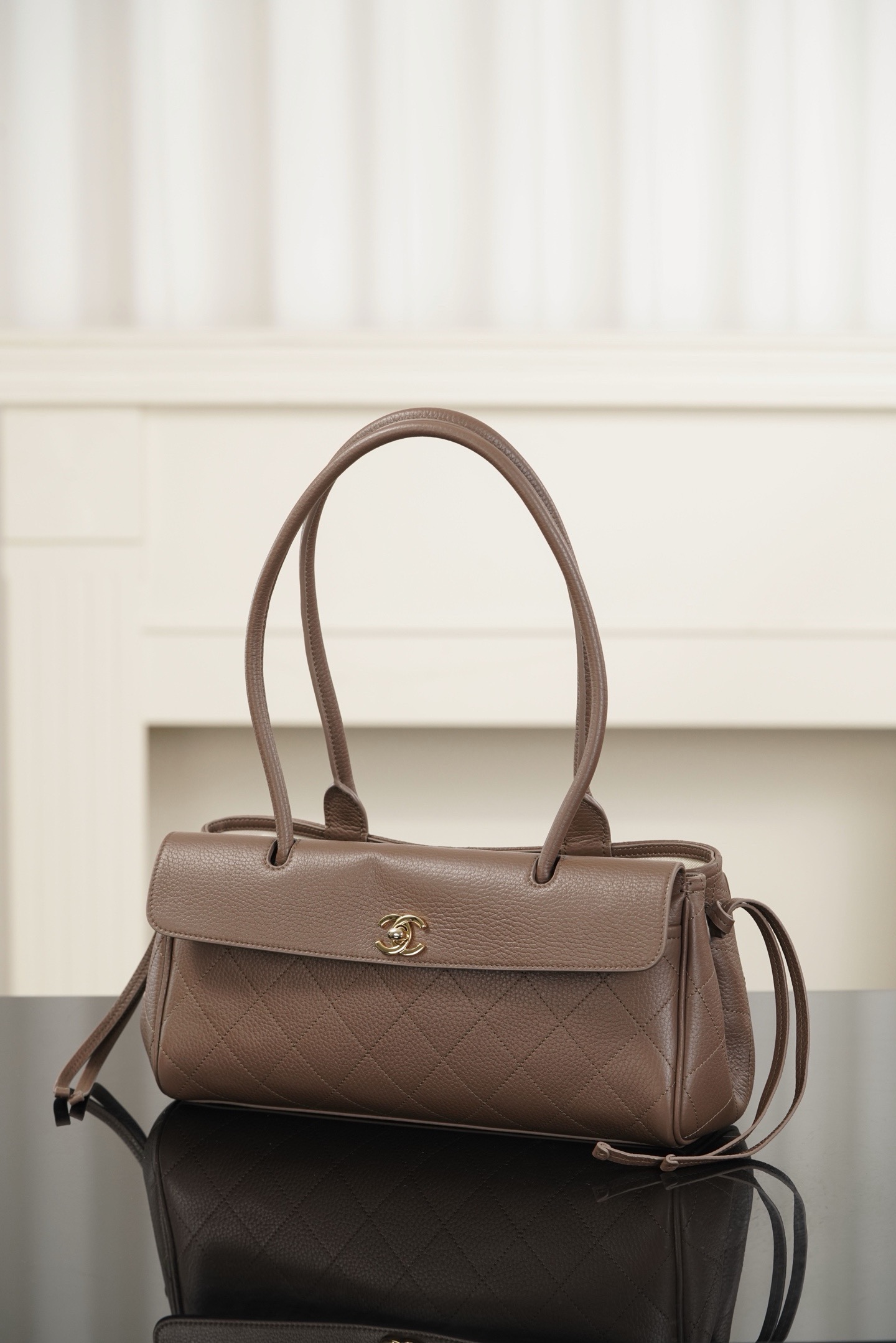 Chanel light brown grained leather baguette bag