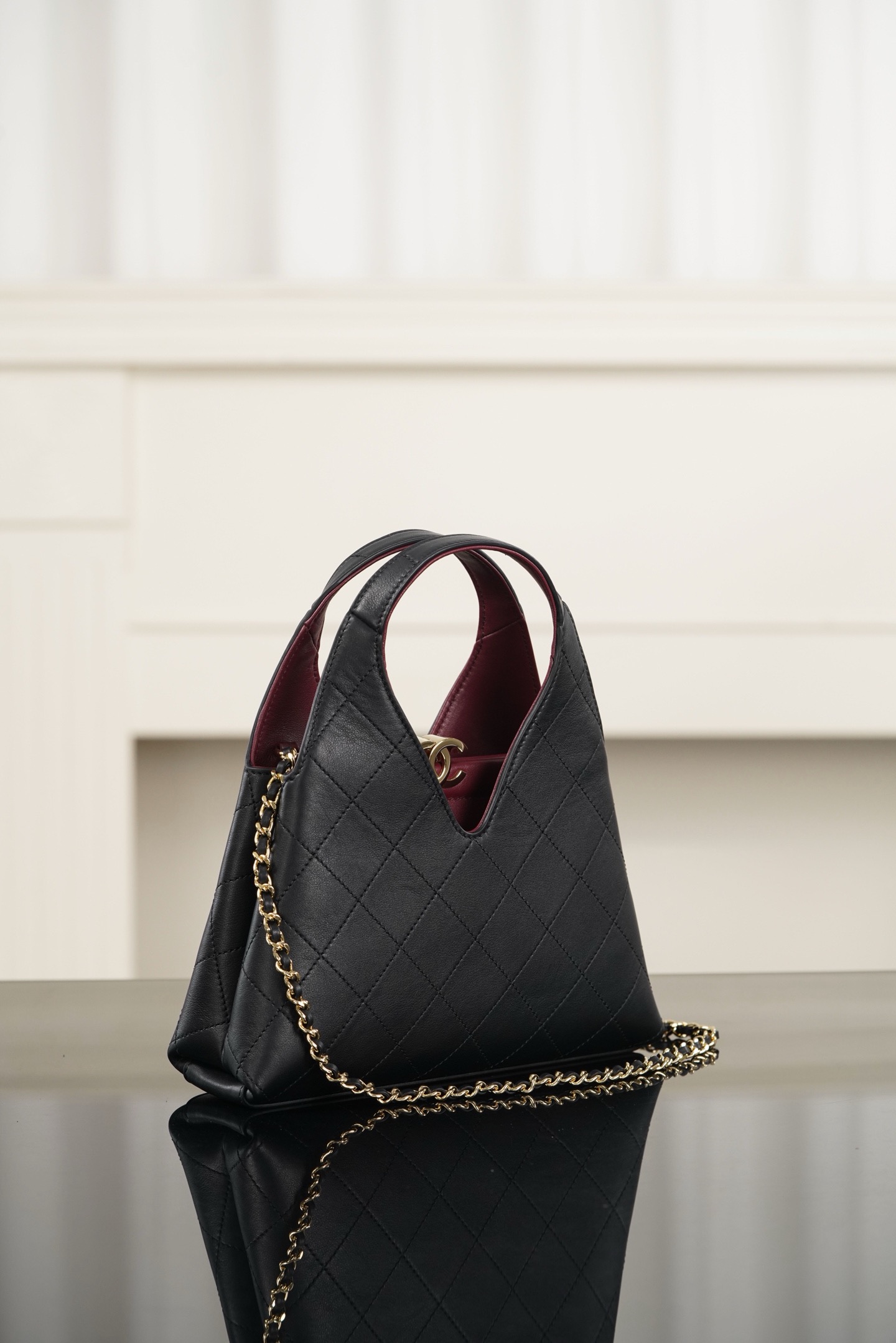 Chanel black quilted cowhide triangle hobo bag