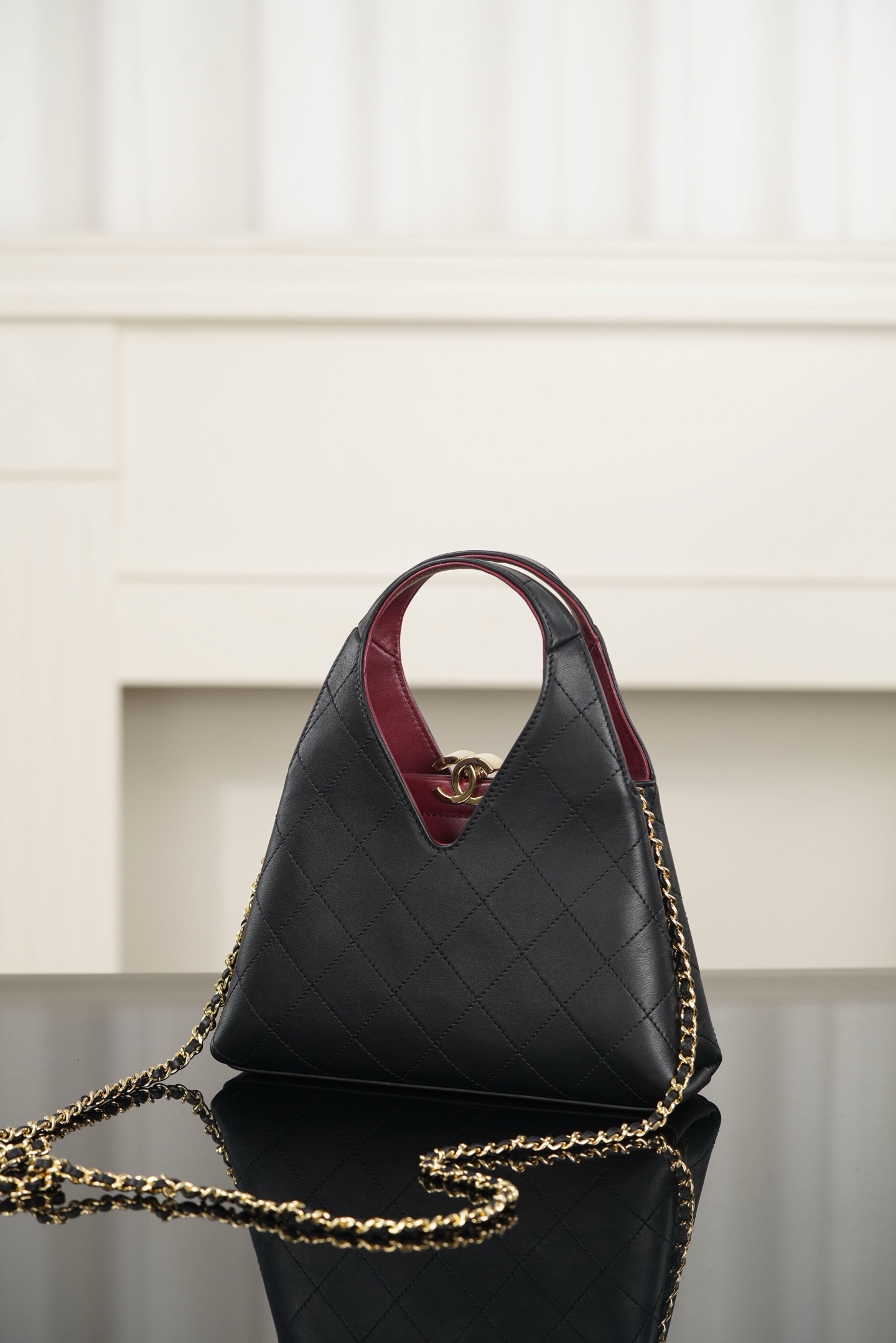 Chanel black quilted cowhide triangle hobo bag
