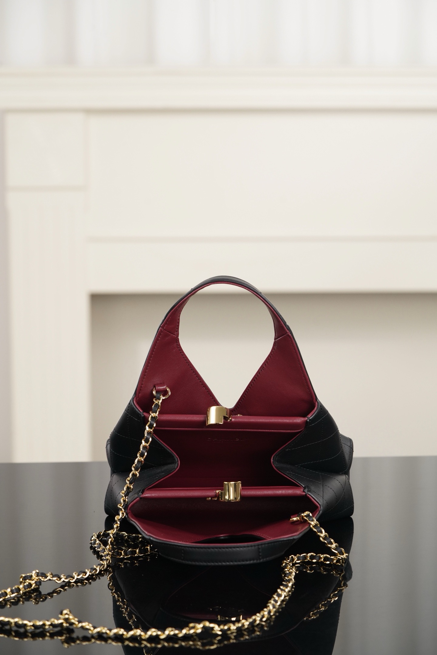Chanel black quilted cowhide triangle hobo bag