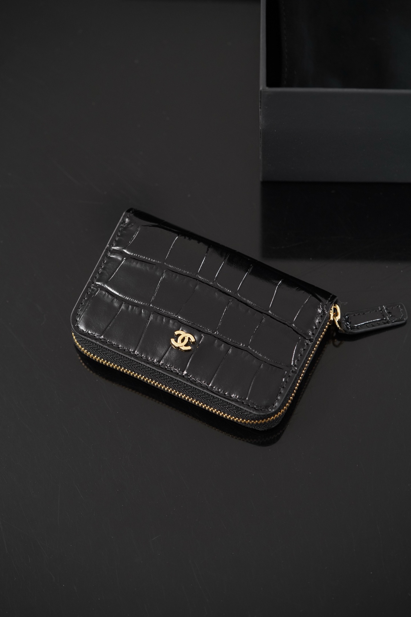 Chanel 26S black crocodile‑embossed zipped card holder