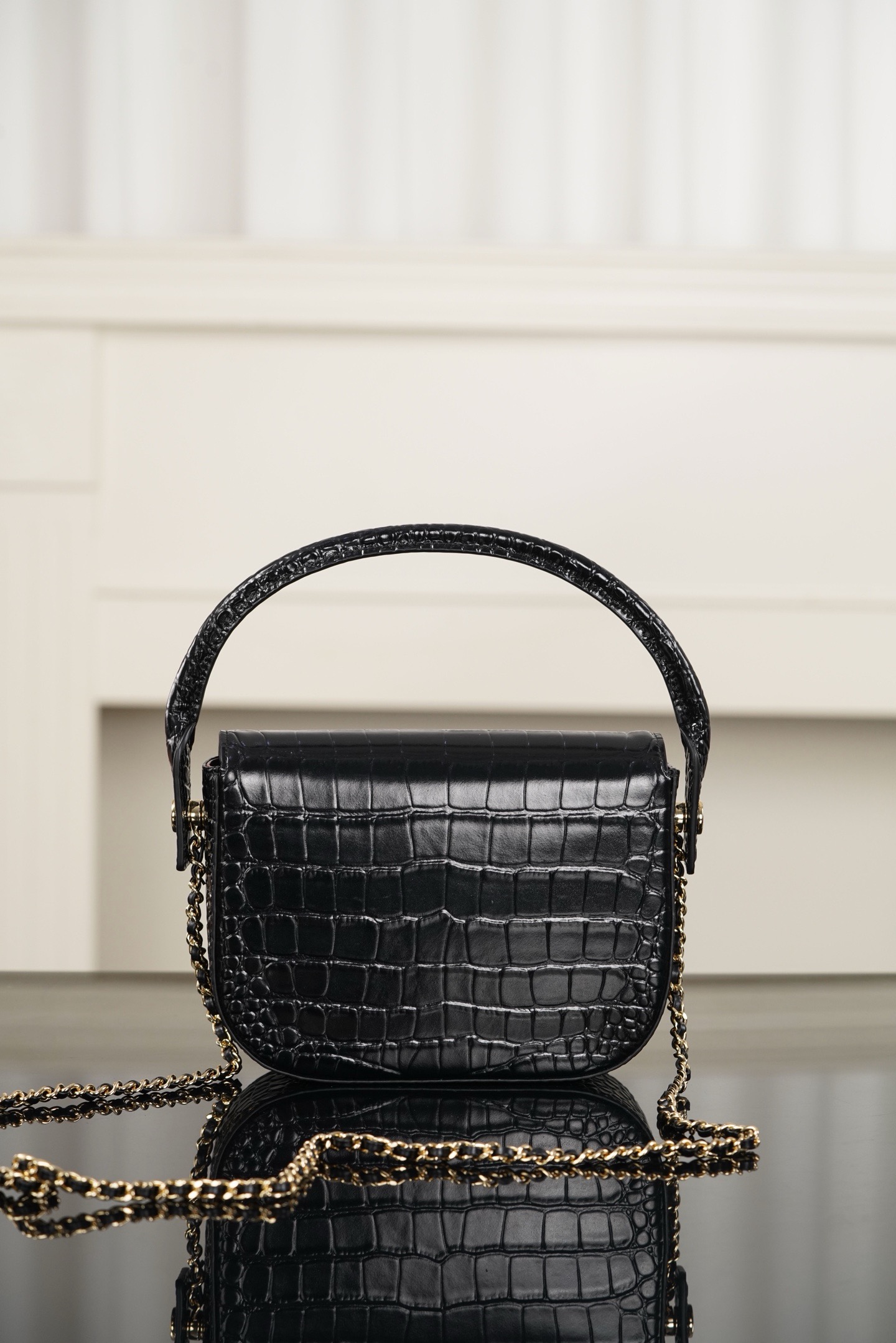 Chanel 26A black crocodile embossed top handle bag