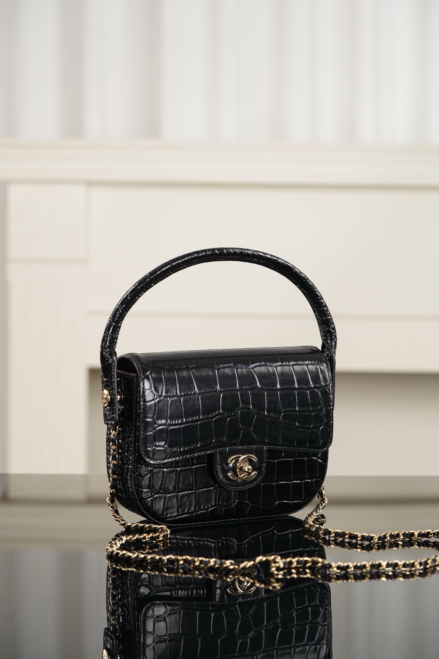 Chanel 26A black crocodile embossed top handle bag