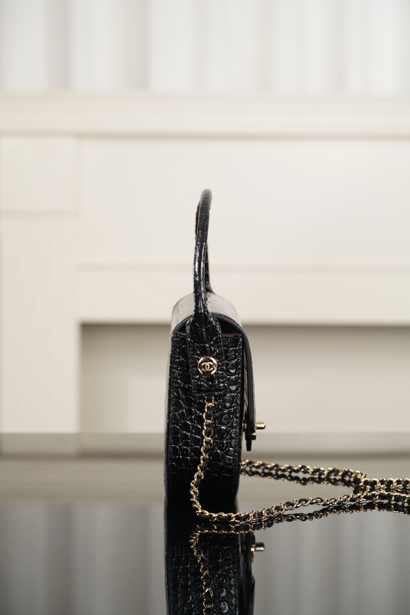 Chanel 26A black crocodile embossed top handle bag